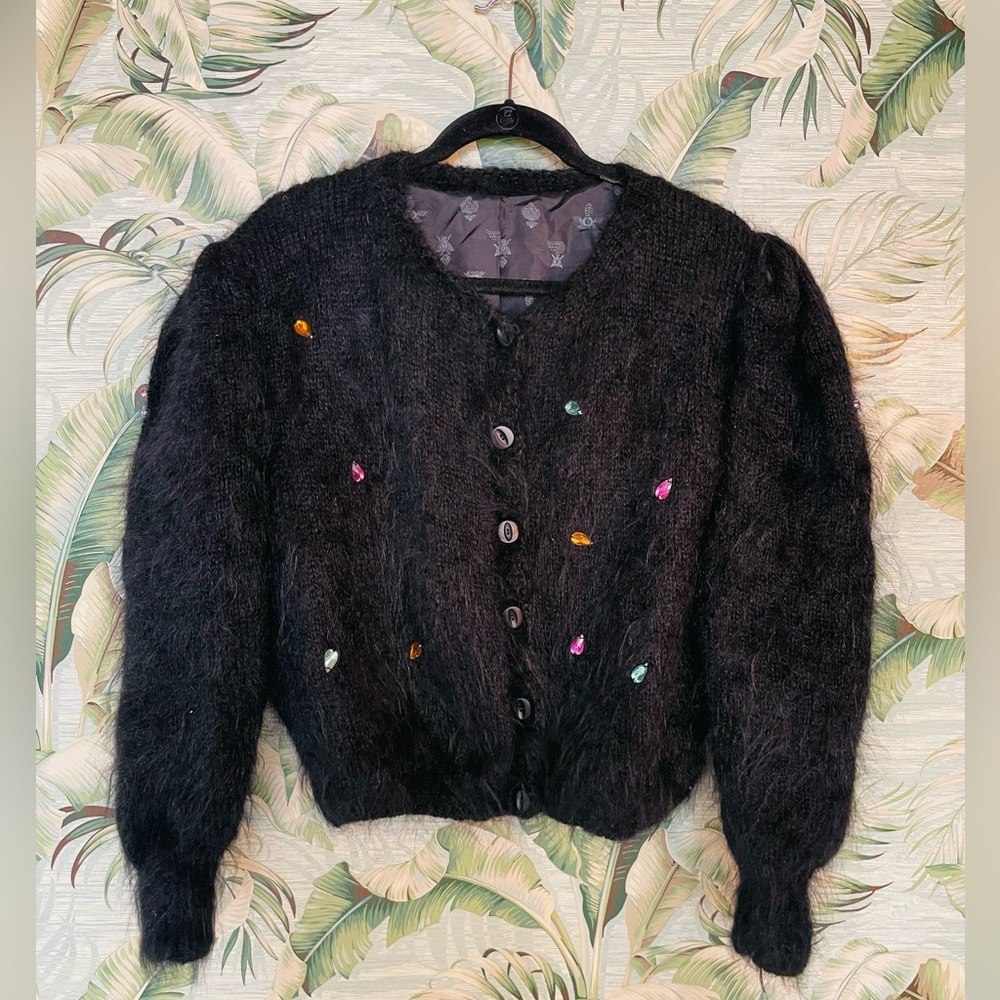 Vintage black cardigan. Puffy arms, with jewels and butterflies for color.